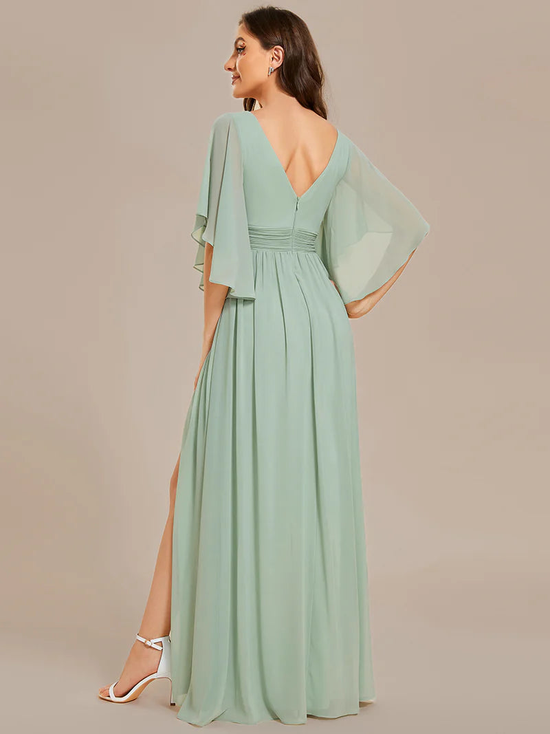 Chic and classy bridesmaid dress in mint green with pleats and round neck