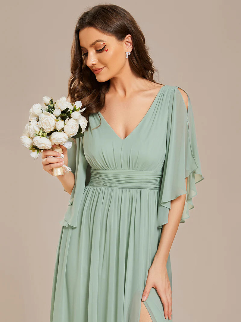 Chic and classy bridesmaid dress in mint green with pleats and round neck