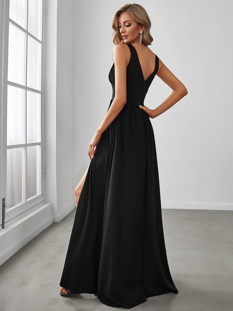 Black elegant floor-length evening dress with V-neckline, empire waist, and high slit