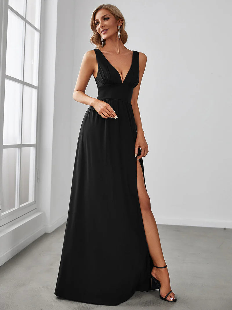 Black elegant floor-length evening dress with V-neckline, empire waist, and high slit