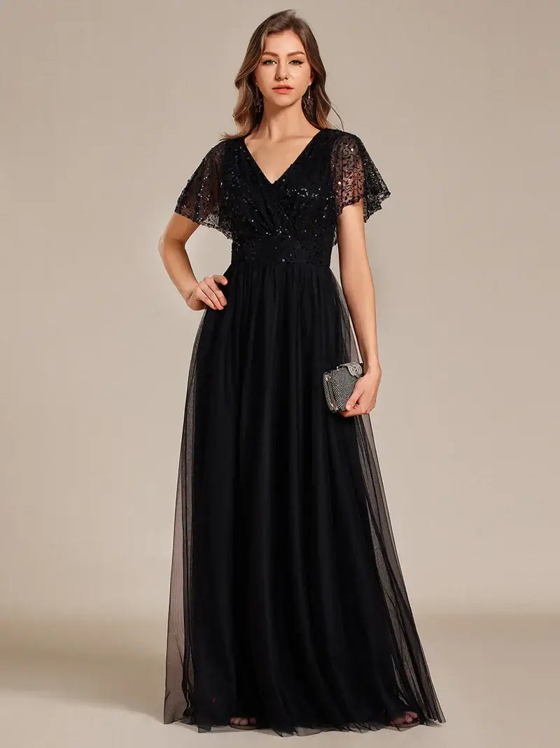 Black elegant V-neck tulle dress with ruffle sleeves, empire waist, and sparkling paillettes