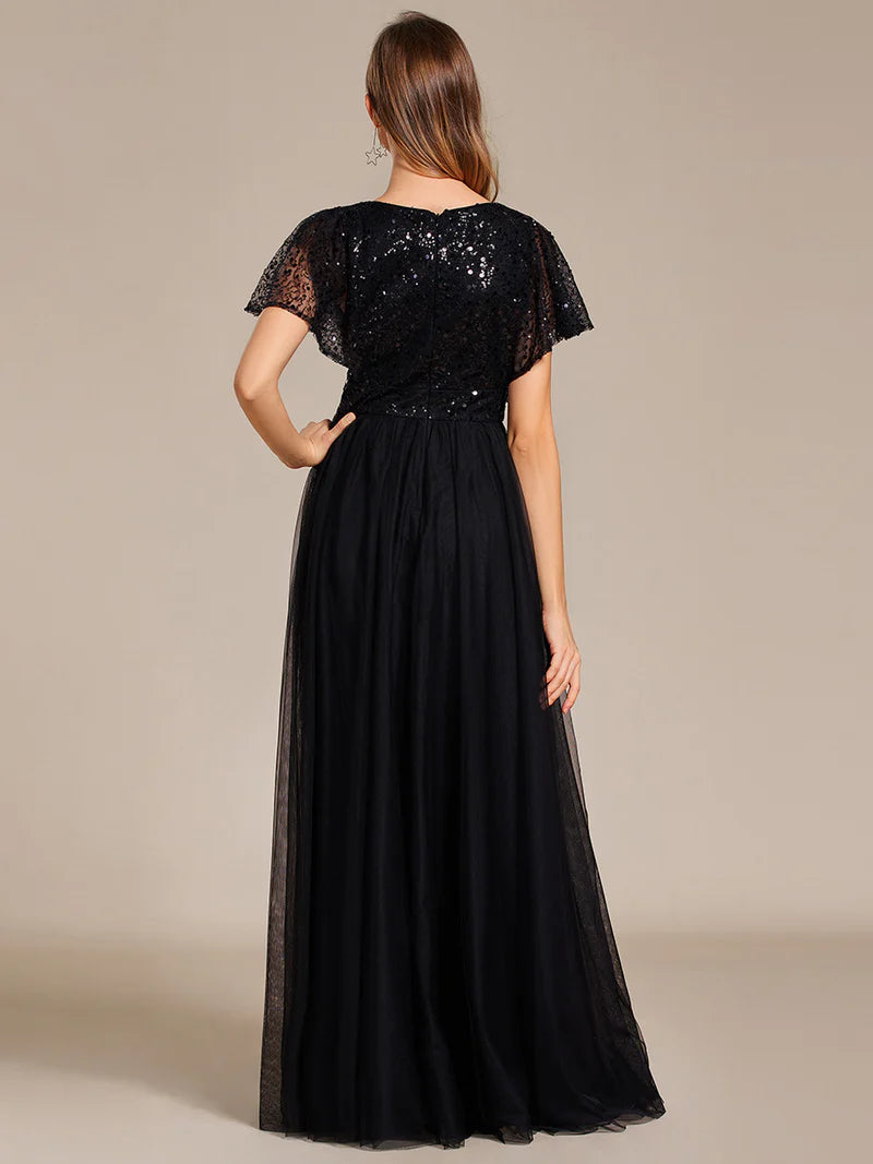 Black elegant V-neck tulle dress with ruffle sleeves, empire waist, and sparkling paillettes