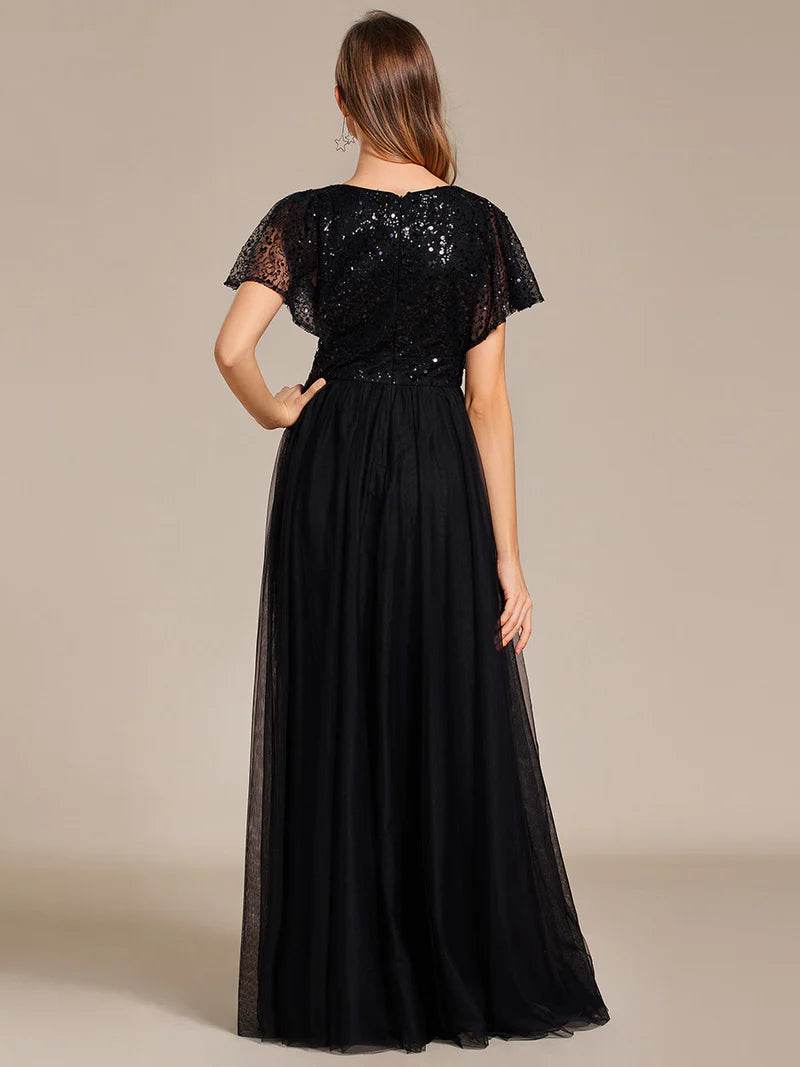Elegant V-Neck Tulle Dress – Ruffle Sleeves, Empire Waist & Sparkling Paillettes - Biamonde