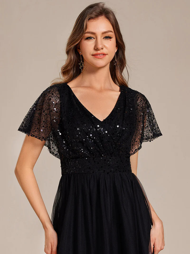 Black elegant V-neck tulle dress with ruffle sleeves, empire waist, and sparkling paillettes