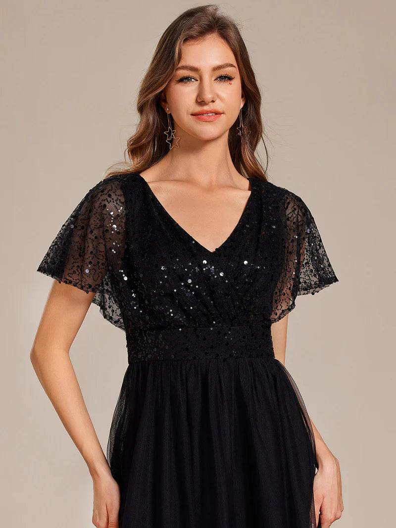 Elegant V-Neck Tulle Dress – Ruffle Sleeves, Empire Waist & Sparkling Paillettes - Biamonde