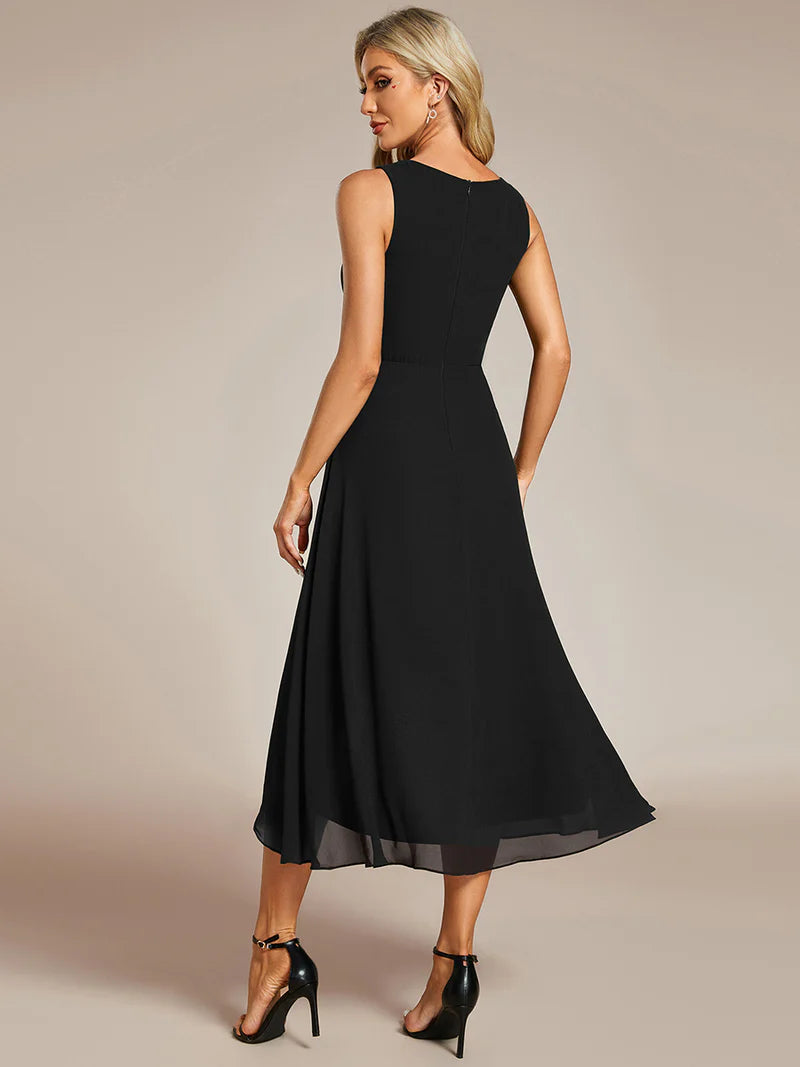 Black Tea-length chiffon wedding guest dress with V-neckline and delicate appliqués
