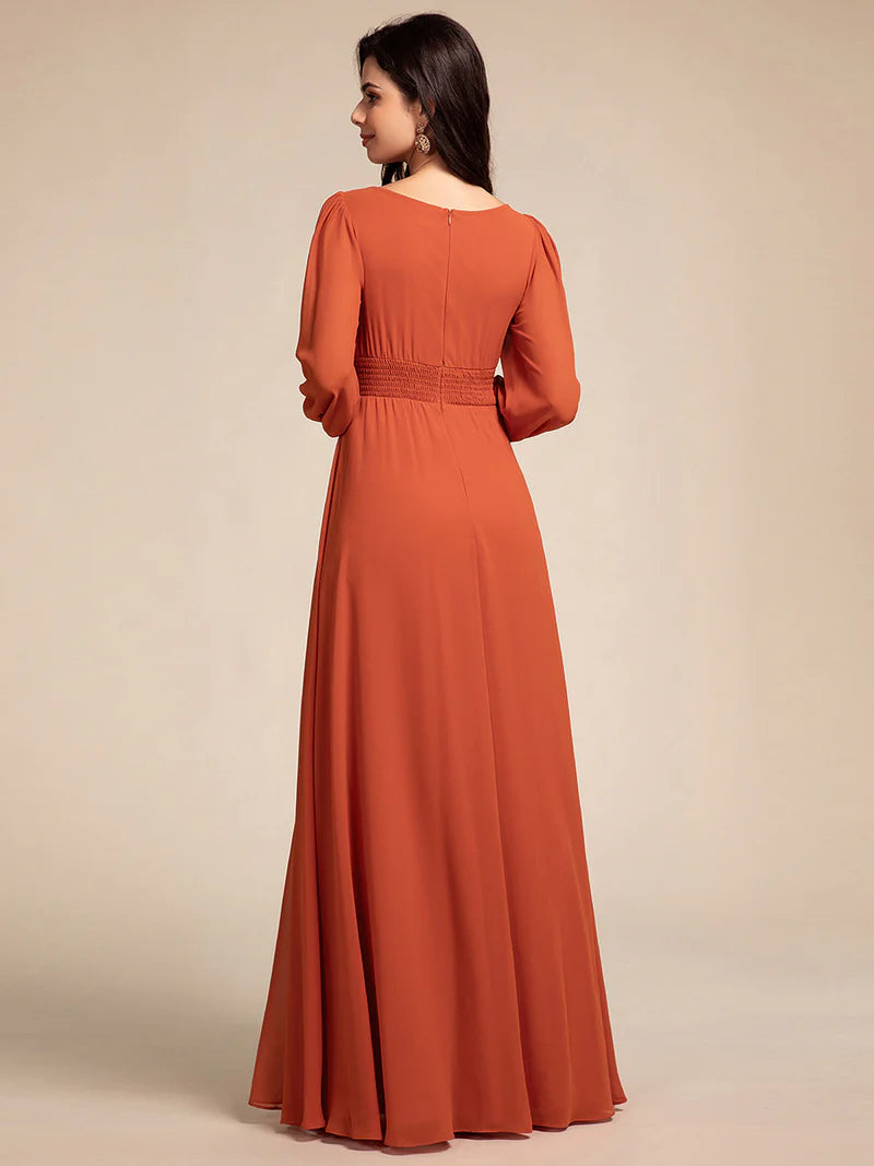 Burnt orange bridesmaid dress with round neckline and long lantern sleeves