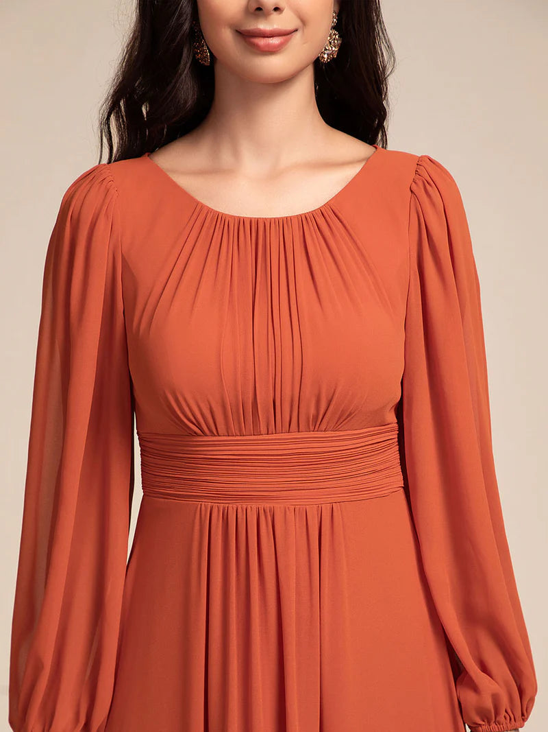 Burnt orange bridesmaid dress with round neckline and long lantern sleeves