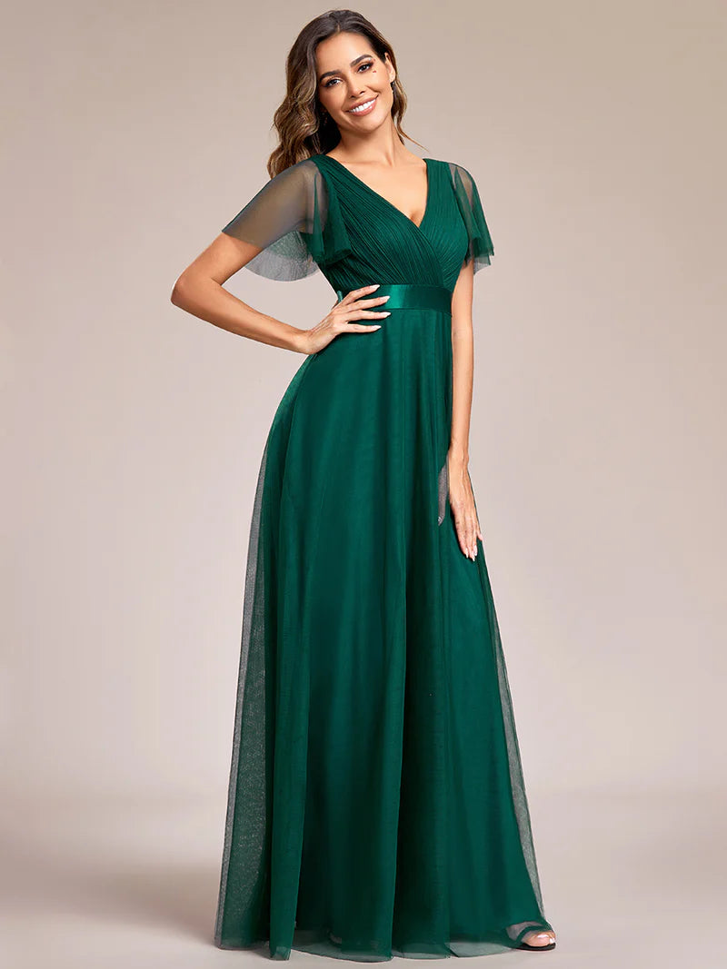 Dark green elegant A-line bridesmaid dress with V-neckline and floor-length silhouette