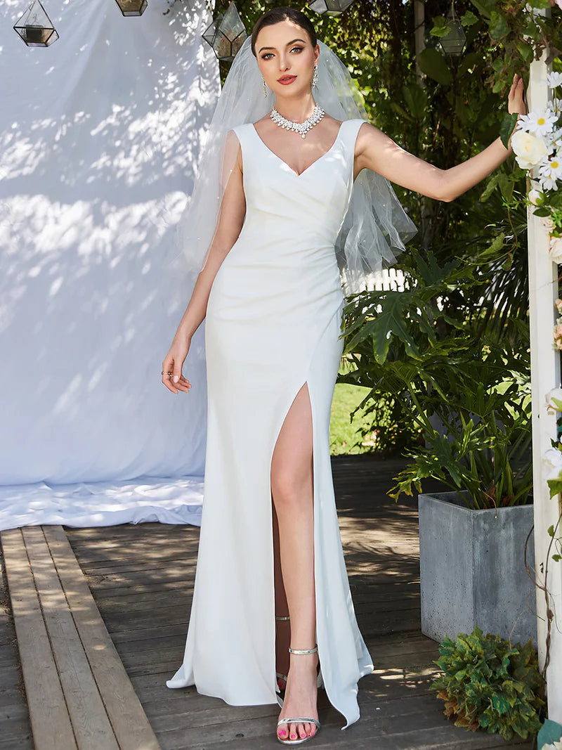 Elegant Deep V-Neck Fishtail White Wedding Dress with Sleeveless Design & Front Split