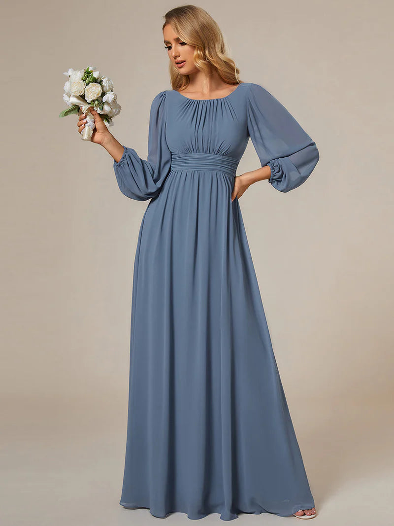 Dusty blue bridesmaid dress with round neckline and long lantern sleeves
