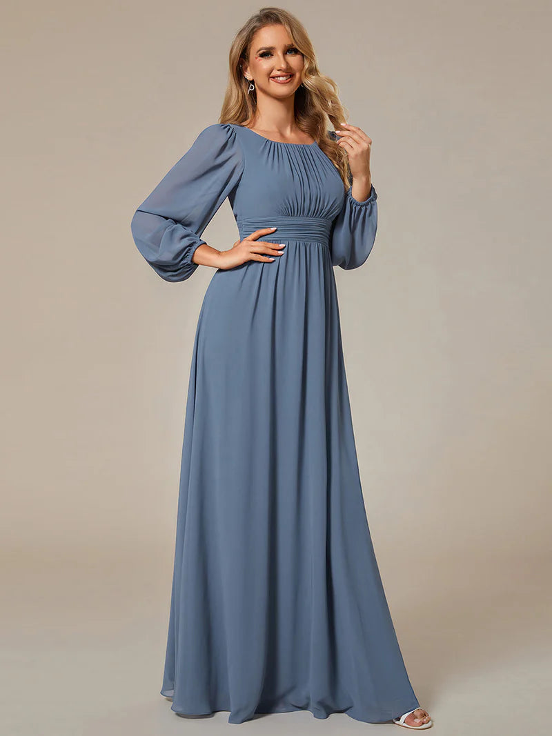 Dusty blue bridesmaid dress with round neckline and long lantern sleeves