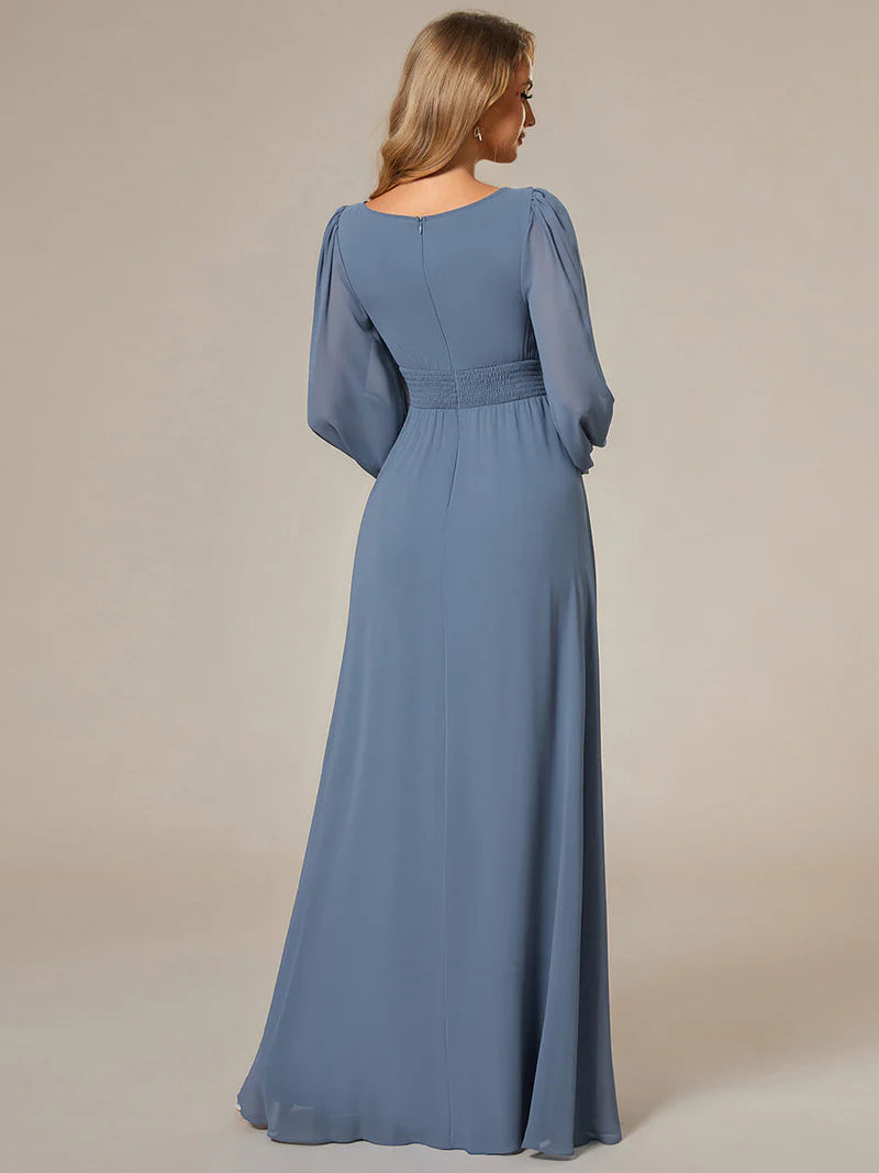 Dusty blue bridesmaid dress with round neckline and long lantern sleeves