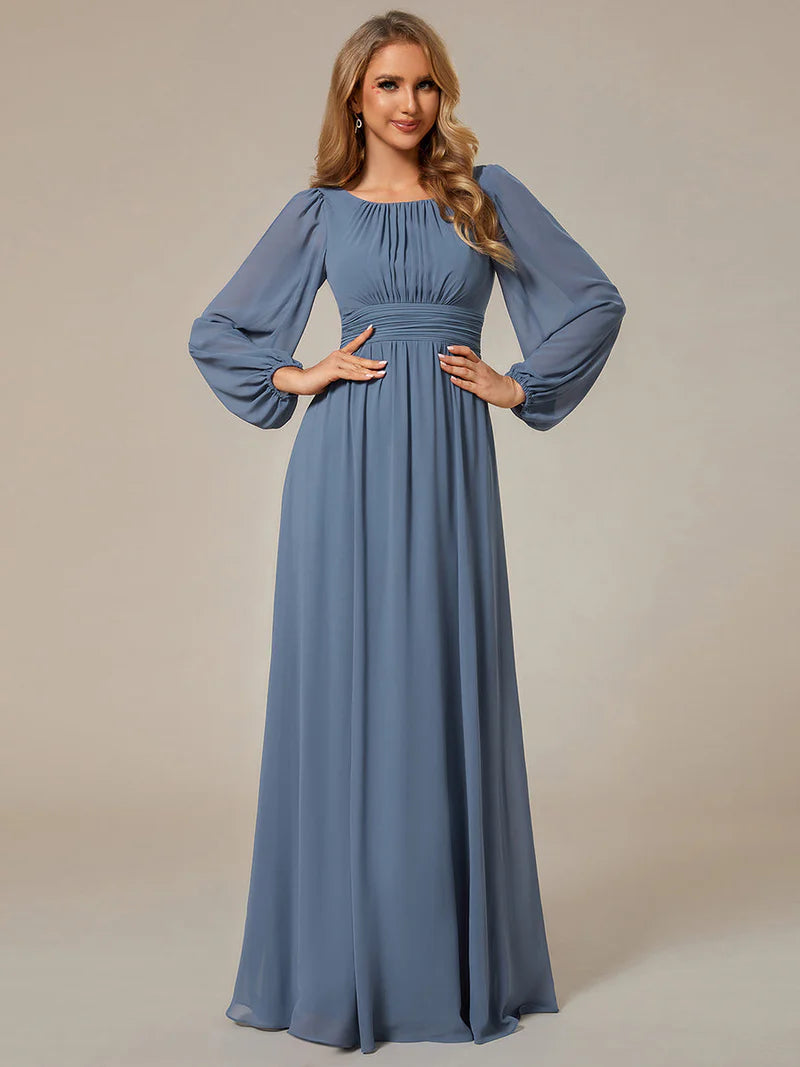 Dusty blue bridesmaid dress with round neckline and long lantern sleeves