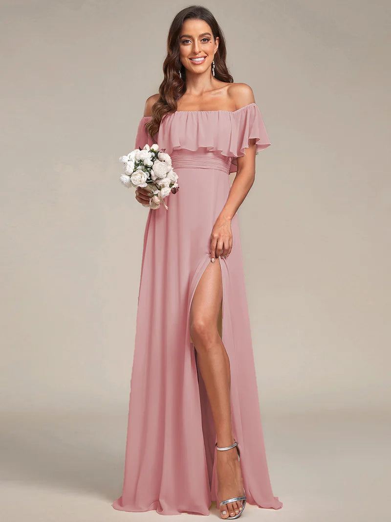 Dusty rose bridesmaid dress with ruffle detailing and thigh-high split