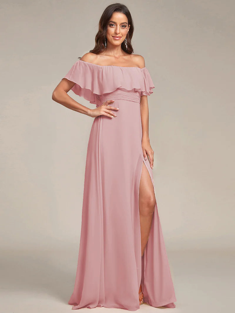 Dusty rose bridesmaid dress with ruffle detailing and thigh-high split
