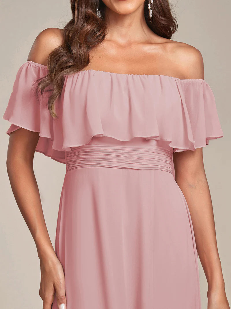 Dusty rose bridesmaid dress with ruffle detailing and thigh-high split