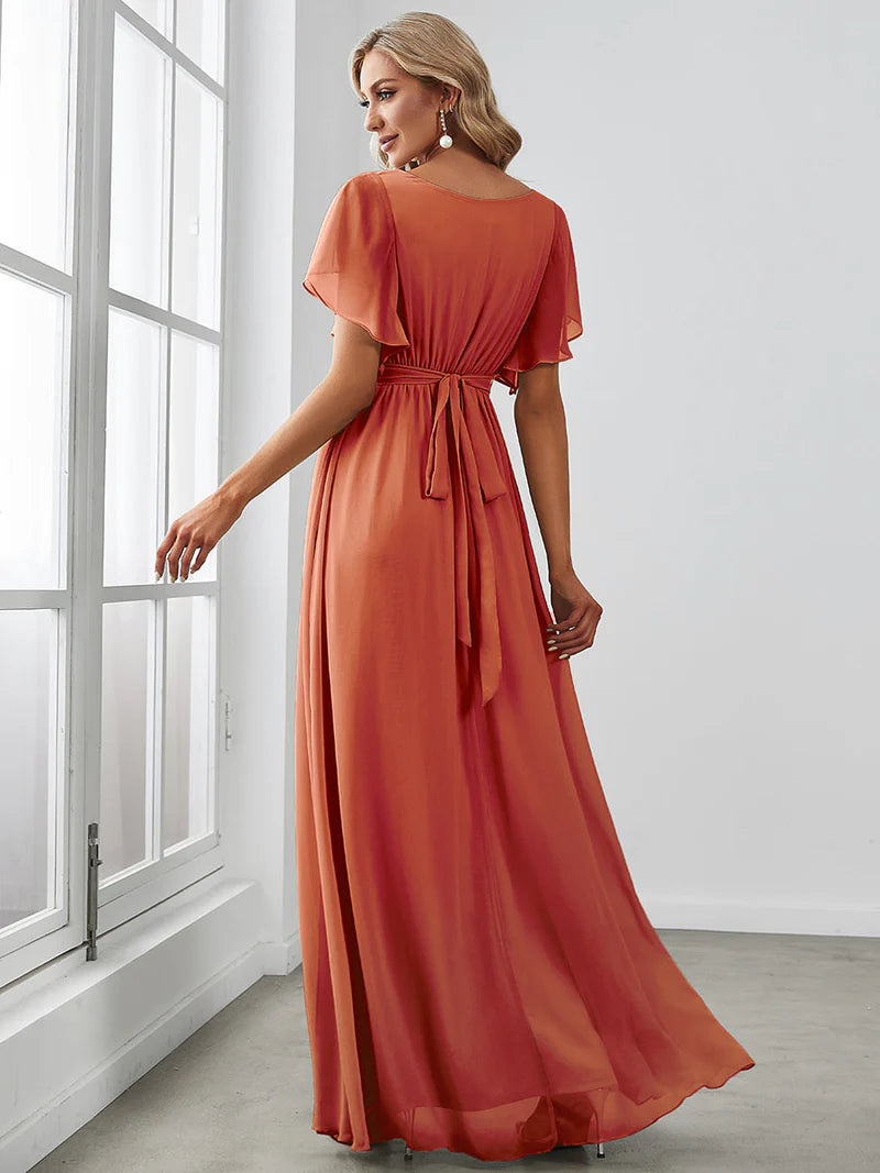 Elegant A-line bridesmaid burnt orange dress with deep V-neckline and fluttery ruffle sleeves