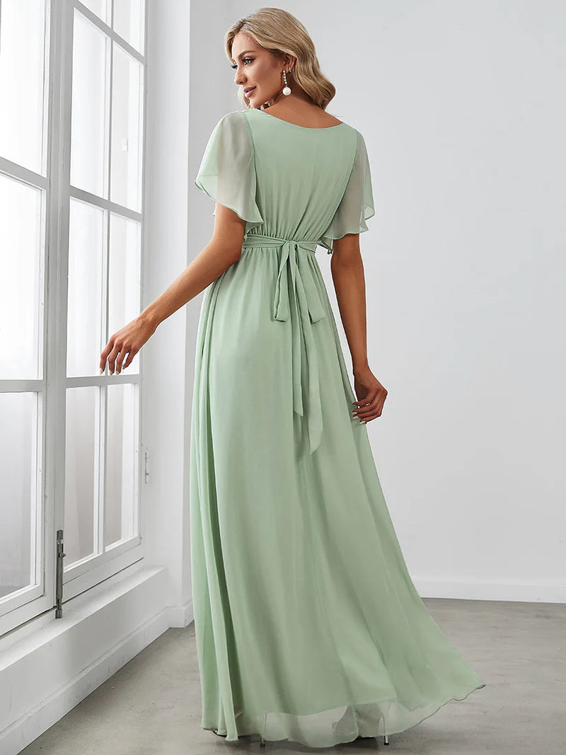 Elegant A-line bridesmaid mint green dress with deep V-neckline and fluttery ruffle sleeves