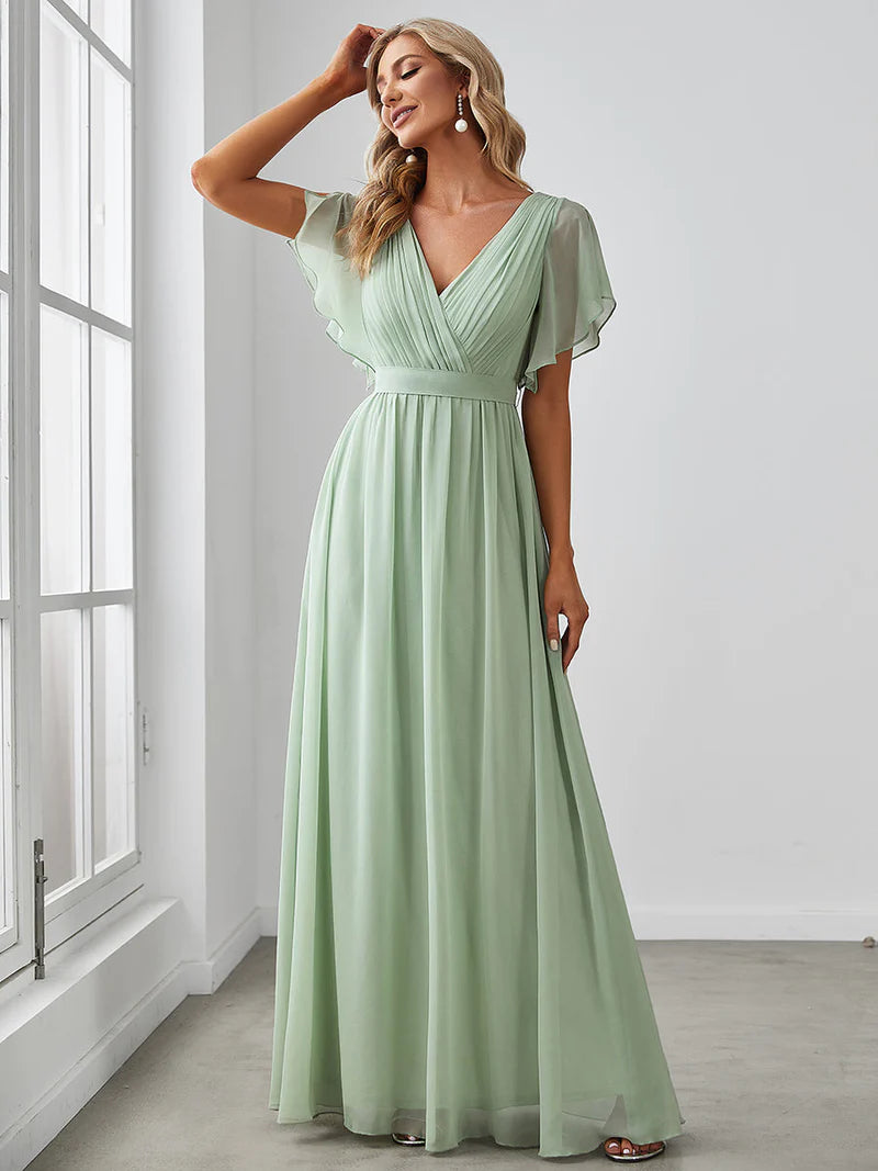 Elegant A-line bridesmaid mint green dress with deep V-neckline and fluttery ruffle sleeves