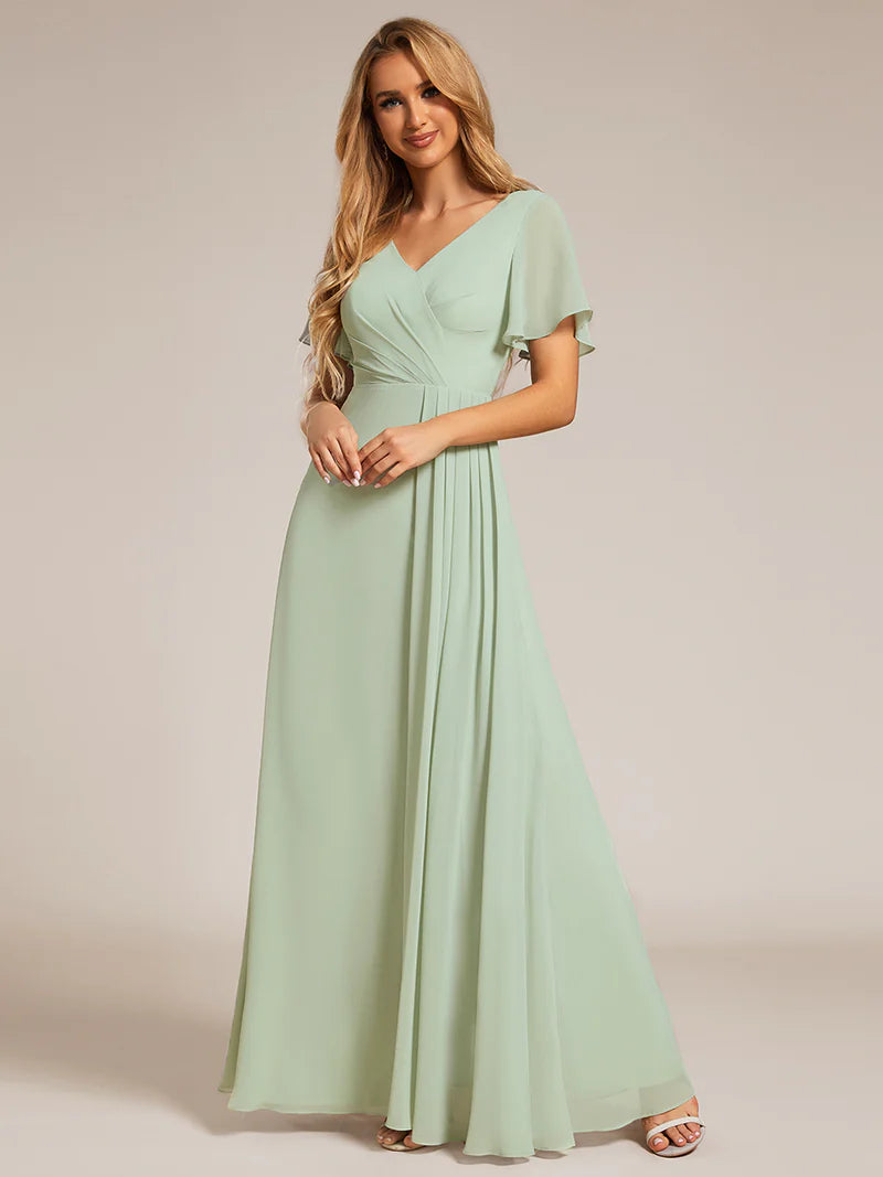 Elegant asymmetrical chiffon evening mint green dress with lotus leaf ruffle sleeves and ruched empire waist