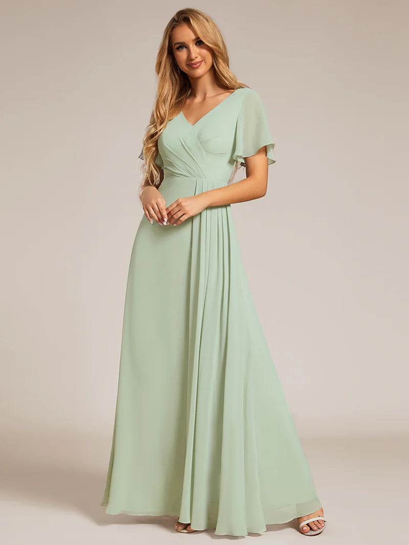 Elegant Asymmetrical Chiffon Evening Dress with Lotus Leaf Ruffle Sleeves and Ruched Empire Waist - Biamonde