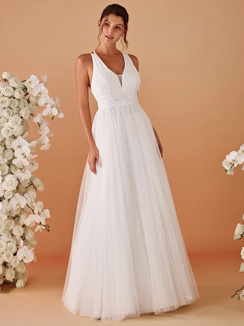 Elegant white mesh wedding dress with V-neckline, floral appliqués, and open back