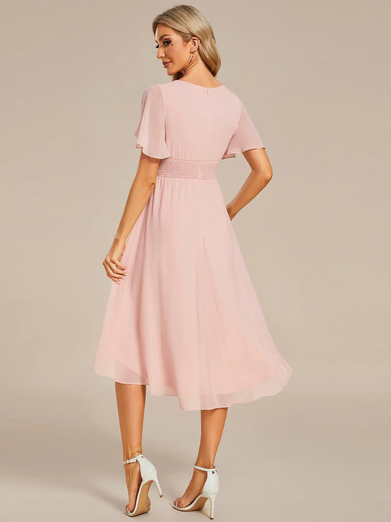 Elegant knee-length A-line wedding guest pink dress with lotus leaf pleated design