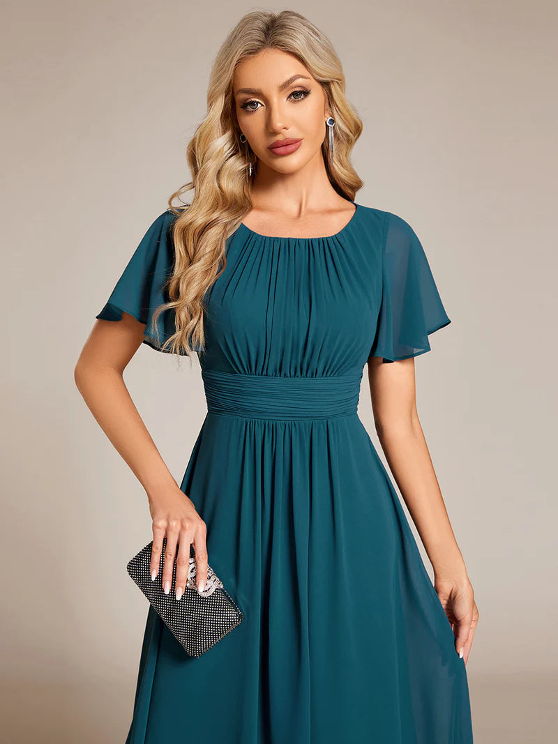 Elegant knee-length A-line wedding guest tea dress with lotus leaf pleated design