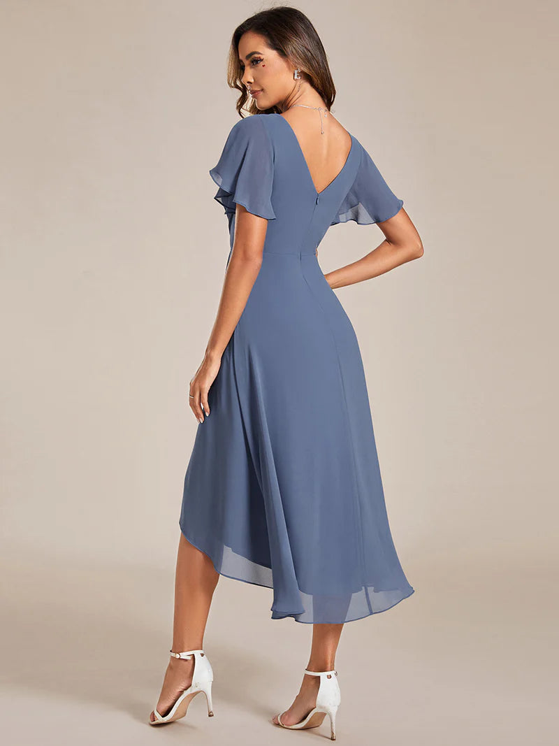 Elegant chiffon wedding guest dusty blue dress with pleated skirt and ruffle accents