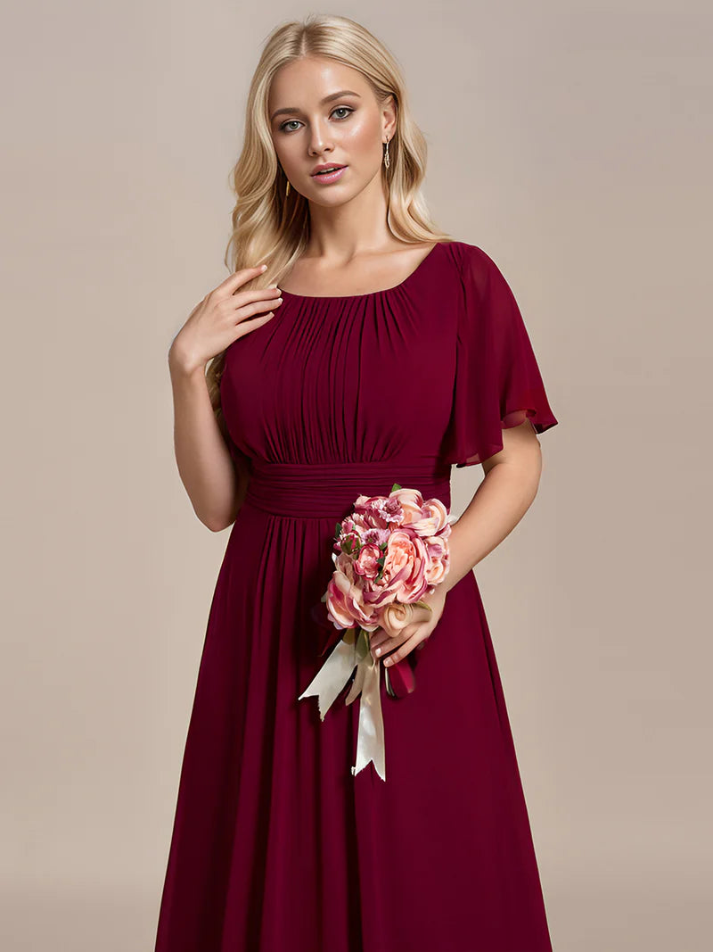 Burgundy elegant round neck bridesmaid dress with pleated skirt and flowy silhouette