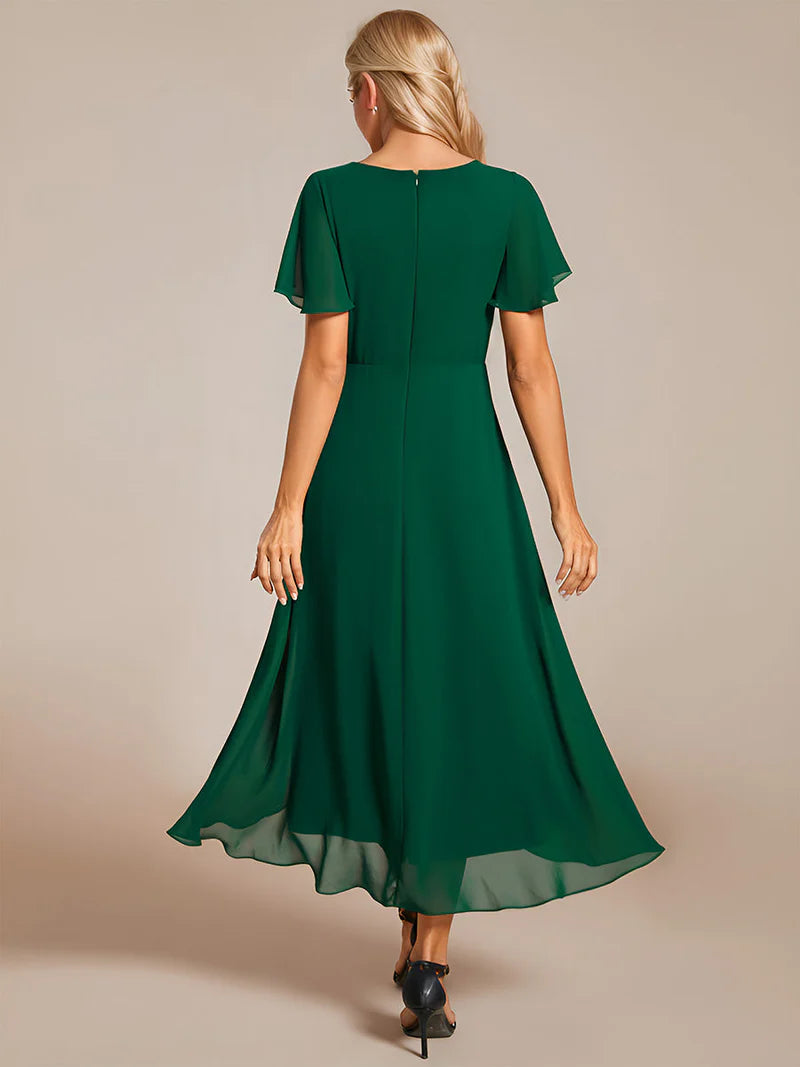 Elegant midi chiffon dark green dress with V-neck and ruffle sleeves, perfect for wedding guests