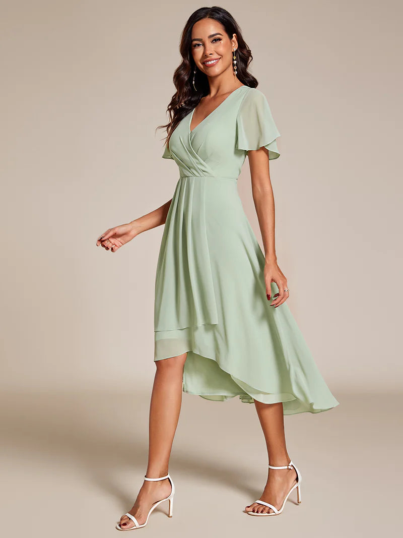Elegant midi chiffon mint green dress with V-neck and ruffle sleeves, perfect for wedding guests