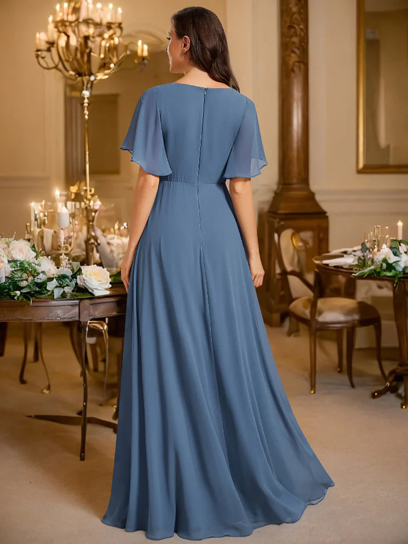 Elegant pleated bridesmaid dusty blue dress with V-neckline and floral appliqués
