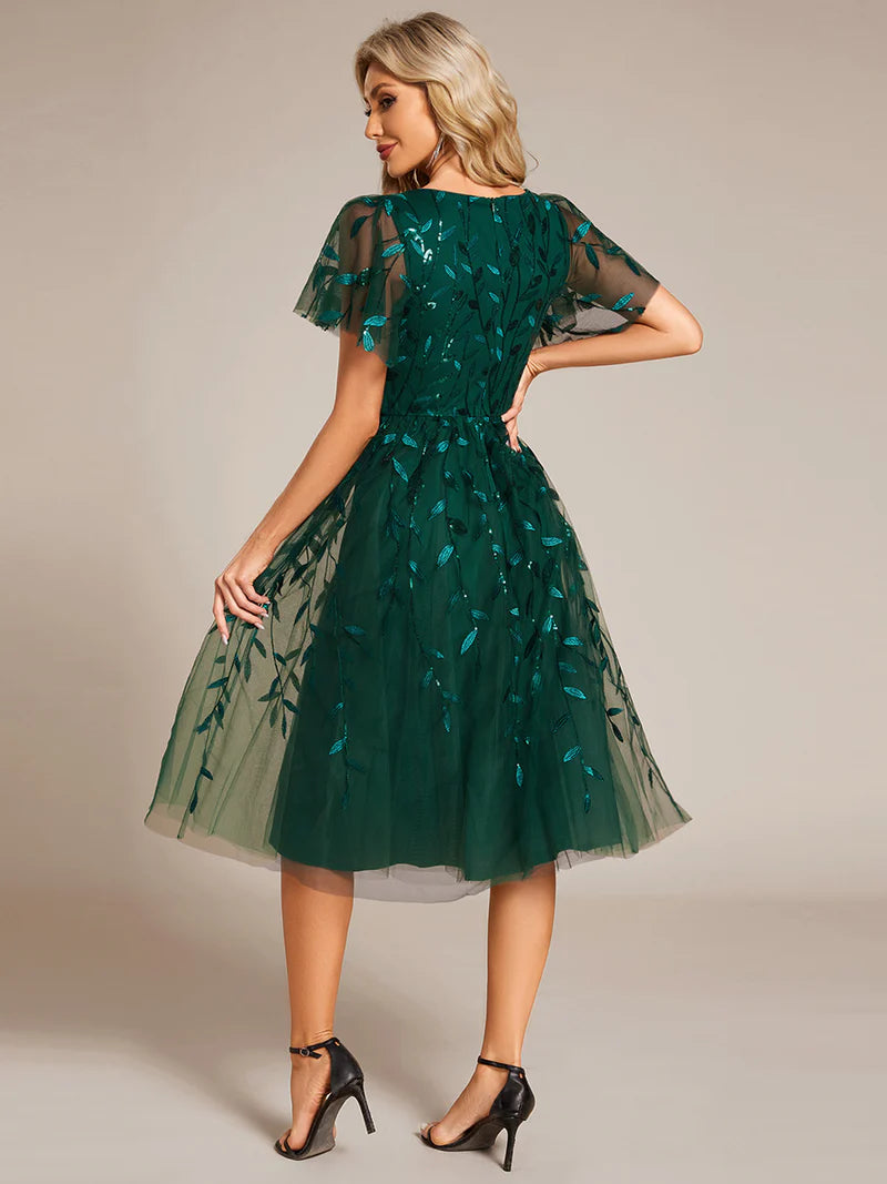 Exquisite midi length Dark Green dress with ruffled sleeves, tulle fabric, sequin details, and embroidery