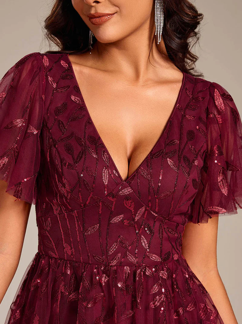 Exquisite midi length burgundy dress with ruffled sleeves, tulle fabric, sequin details, and embroidery