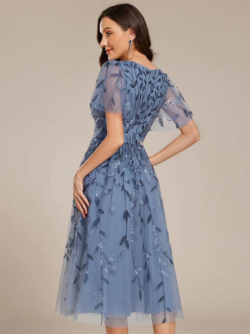 Exquisite Midi-Length Tulle Dress with Ruffled Sleeves, Sequins & Embroidery - Biamonde