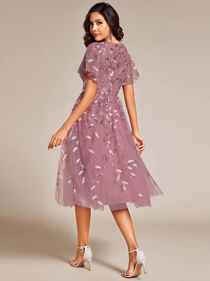 Exquisite Midi-Length Tulle Dress with Ruffled Sleeves, Sequins & Embroidery - Biamonde