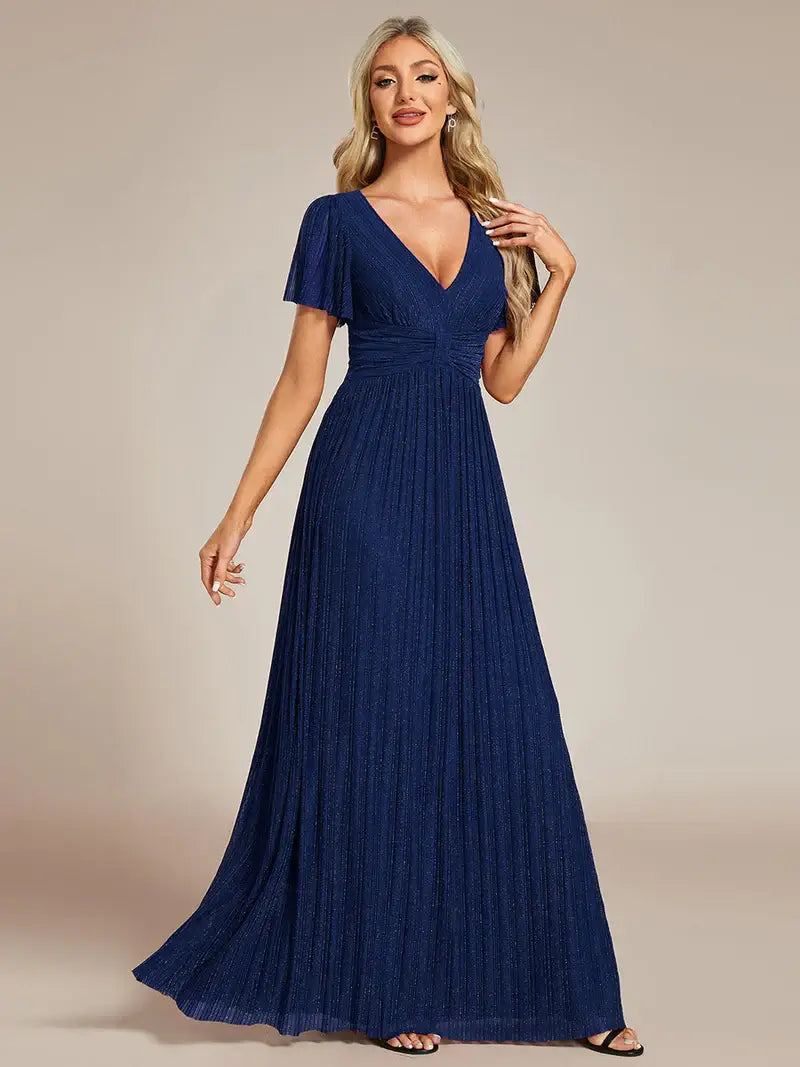Glittery mesh evening navy blue dress with V-neckline and bowknot waist, perfect for elegant parties