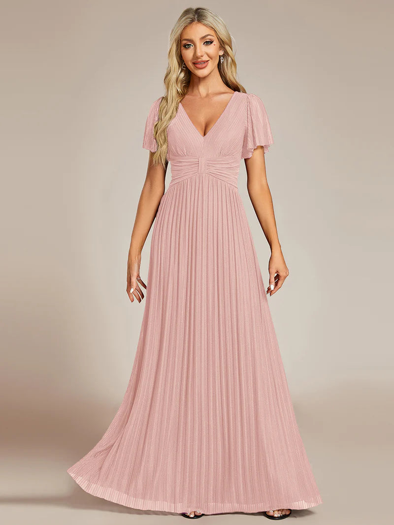 Glittery mesh evening pink dress with V-neckline and bowknot waist, perfect for elegant parties