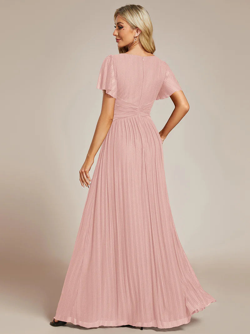 Glittery mesh evening pink dress with V-neckline and bowknot waist, perfect for elegant parties