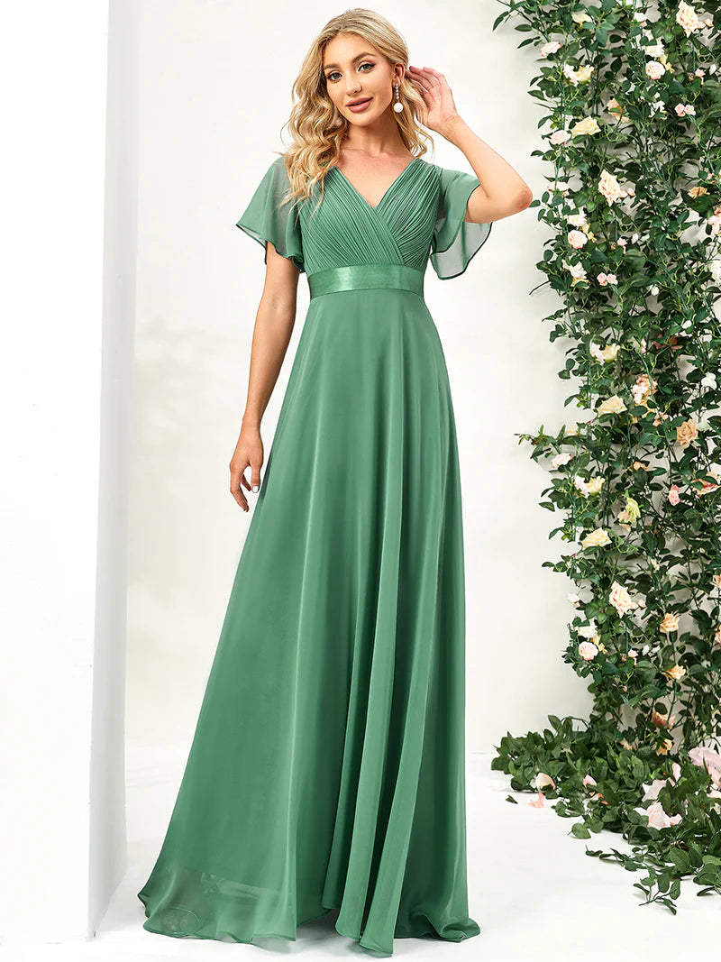 Green bean glamorous evening gown with double V-neckline, ruffle detailing, and padded bodice