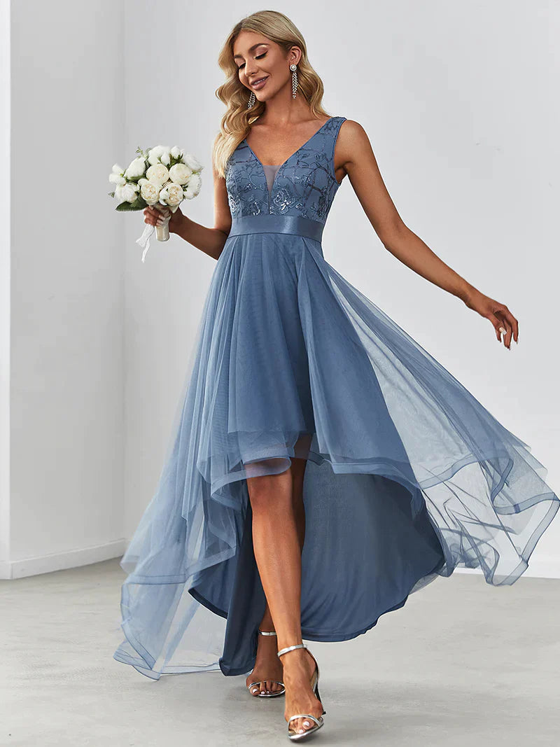 High-low dusty navy tulle prom dress with V-neckline and elegant layered skirt for formal events