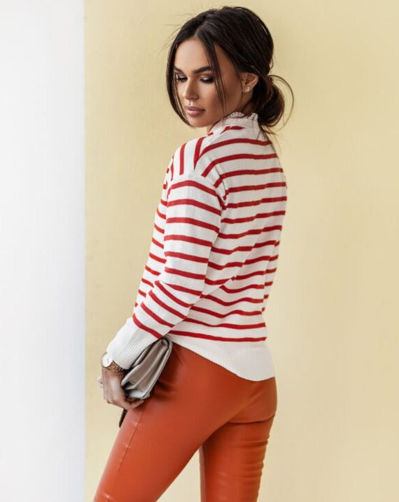 High-waisted orange leggings for women, stretchy and comfortable activewear displayed on flat surface