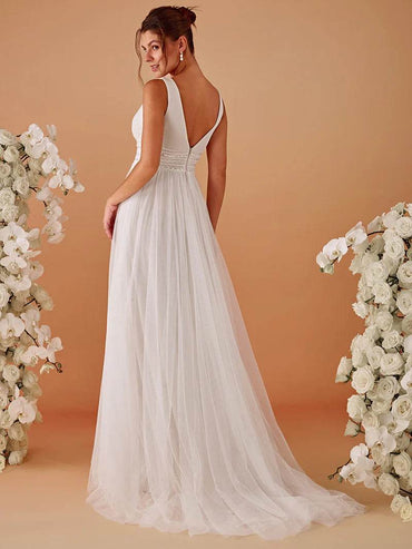 Ivory A-Line Wedding Dress with Deep V-Neck – Sleeveless & Backless Bridal Gown - Biamonde