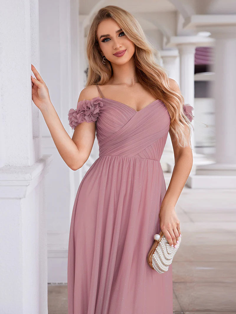 Glamorous sequin gown featuring off-the-shoulder sleeves, sweetheart bodice, and floral accents orhid dress