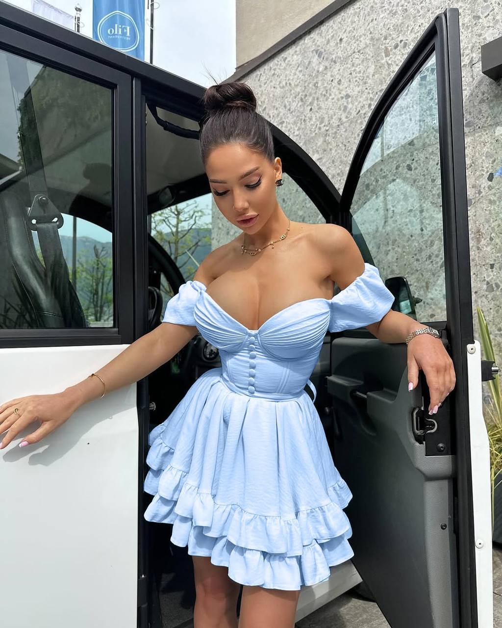 Light blue off-shoulder mini dress with lace-up back and ruffled skirt hem