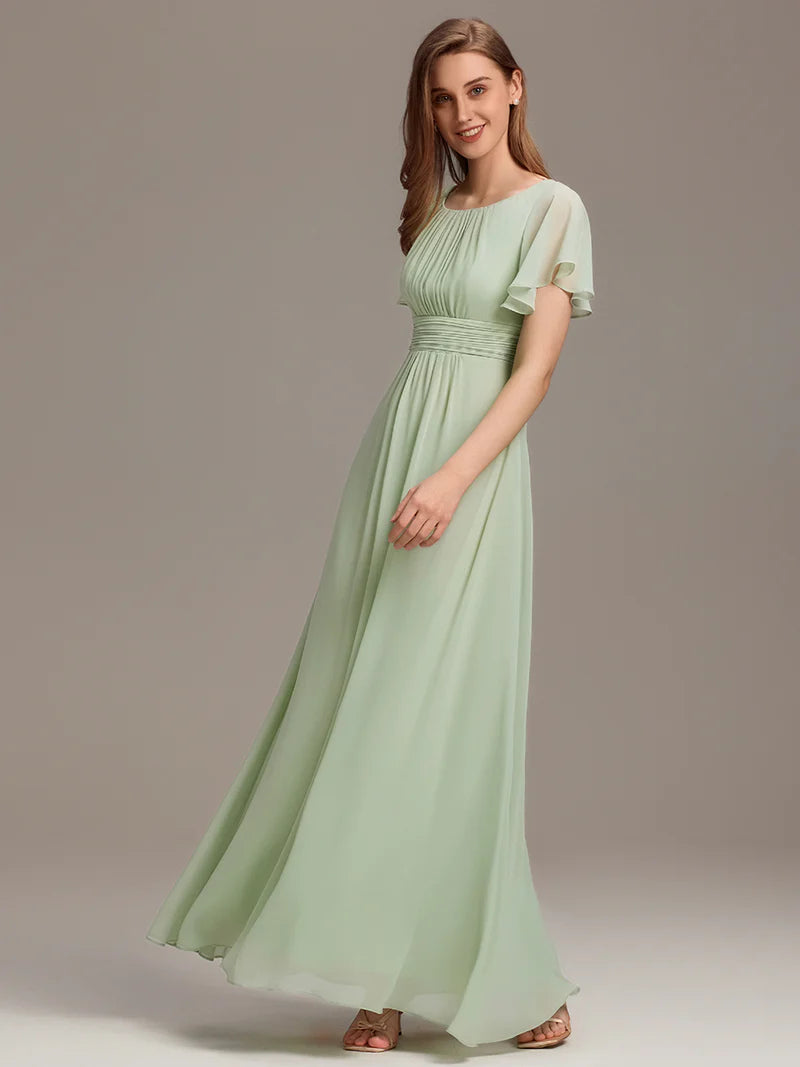Round neck mint green bridesmaid gown in a pleated design for elegant wedding looks