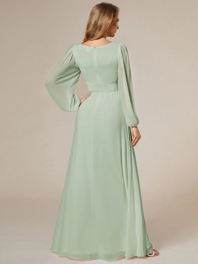 Mint green bridesmaid dress with round neckline and long lantern sleeves