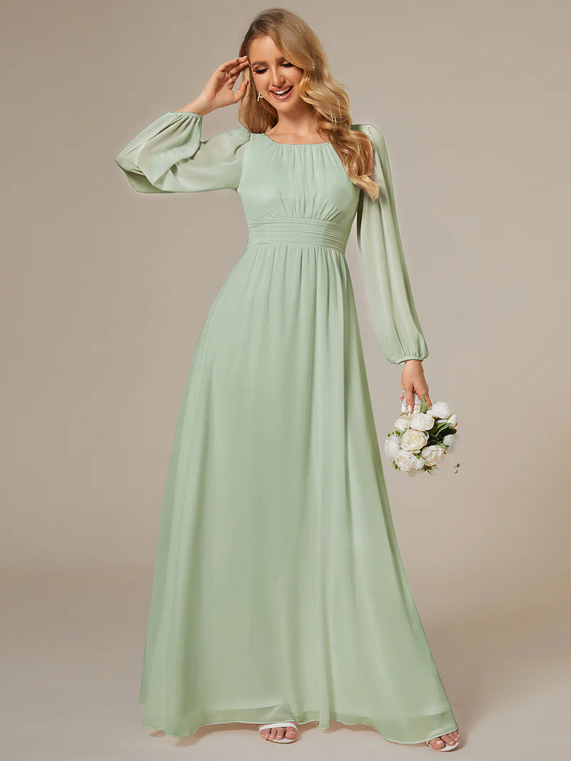 Mint green bridesmaid dress with round neckline and long lantern sleeves